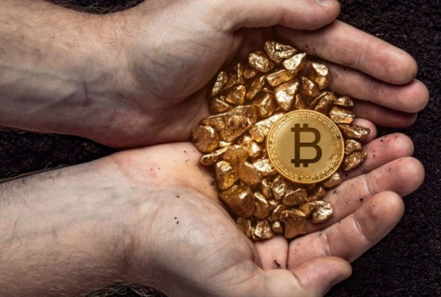 Man holding handful of gold nuggets with BTC coin logo
