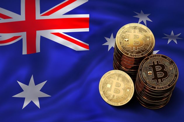 Stacks of physical Bitcoins on an Australia's national flag