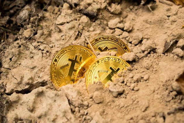 Bitcoin (BTC) is illustrated as gold coins and half-buried